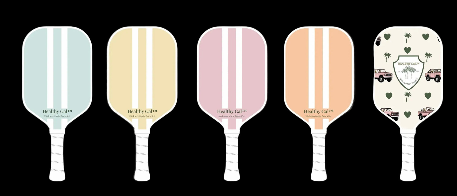Five Healthy Gal™ Move pickleball paddles showing all colorways: sage blue, butter yellow, dusty pink, peach, and a limited-edition print with hearts and palm trees
